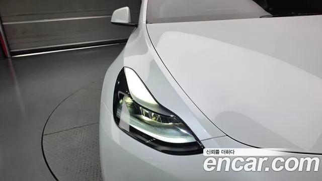 Tesla Model Y — Фото автомобиля 7