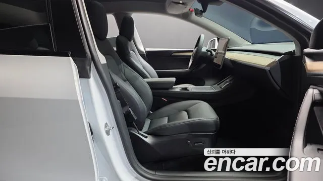 Tesla Model Y — Фото автомобиля 26