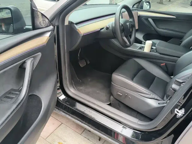 Tesla Model Y — Фото автомобиля 15
