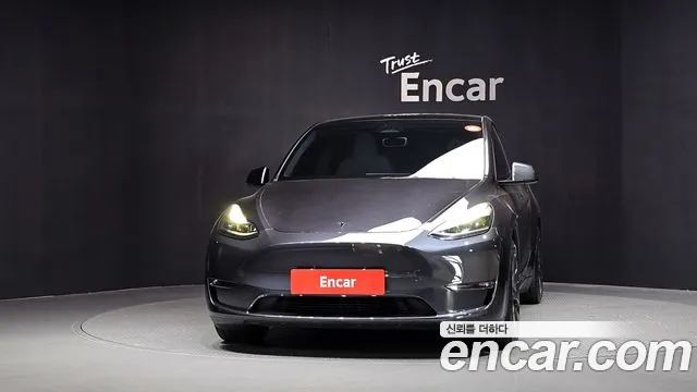 Tesla Model Y — Фото автомобиля 3