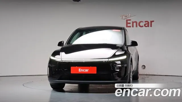 Tesla Model Y — Фото автомобиля 2