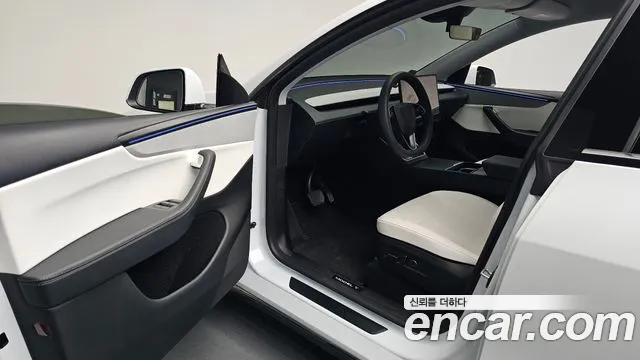 Tesla Model Y — Фото автомобиля 8