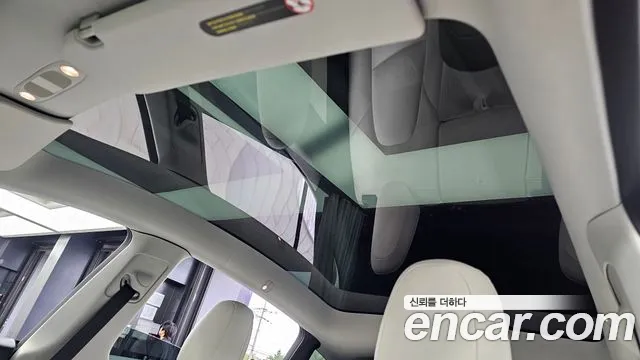 Tesla Model Y — Фото автомобиля 30