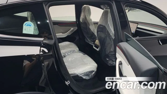 Tesla Model Y — Фото автомобиля 11