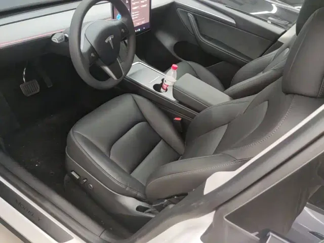 Tesla Model Y — Фото автомобиля 14