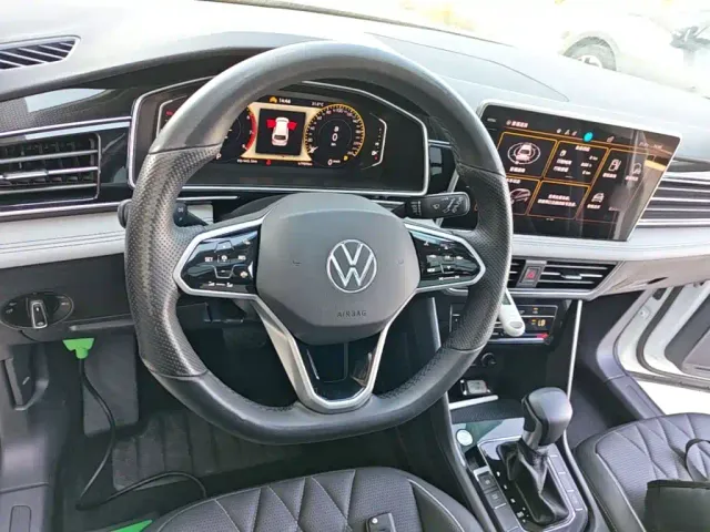Volkswagen Tiguan L — Фото автомобиля 10