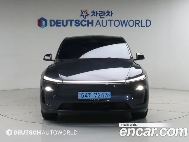 Tesla Model Y — Фото автомобиля 3