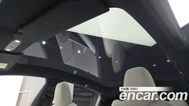 Tesla Model Y — Фото автомобиля 22