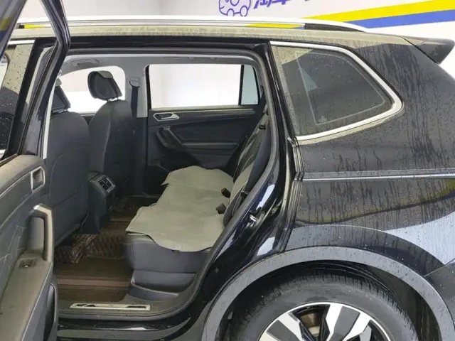 Volkswagen Tiguan L — Фото автомобиля 11