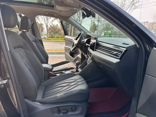 Volkswagen Tiguan L — Фото автомобиля 11