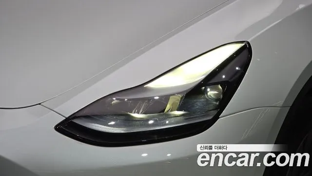 Tesla Model Y — Фото автомобиля 6