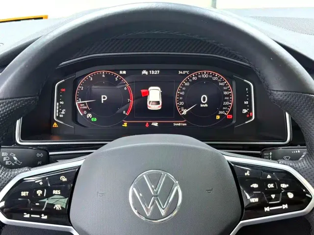 Volkswagen Tiguan L — Фото автомобиля 9