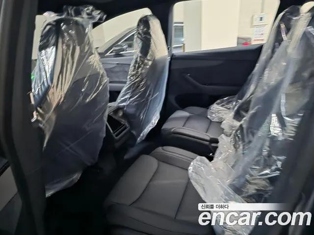 Tesla Model Y — Фото автомобиля 4