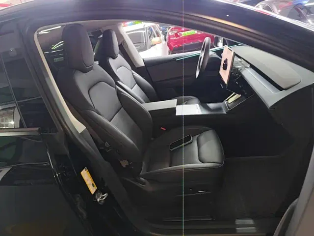 Tesla Model Y — Фото автомобиля 24