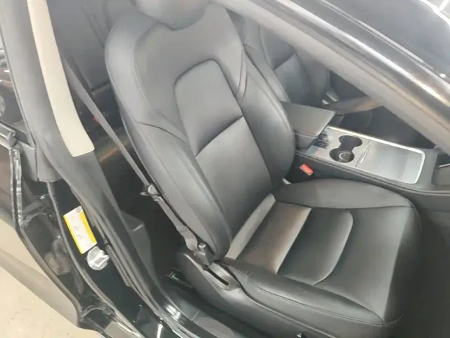 Tesla Model 3 — Фото автомобиля 24