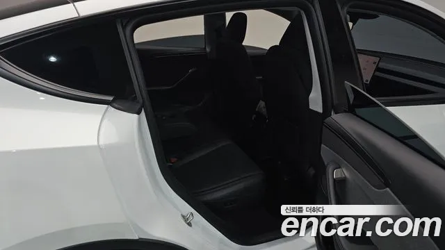Tesla Model Y — Фото автомобиля 11