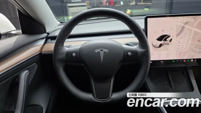 Tesla Model 3 — Фото автомобиля 14