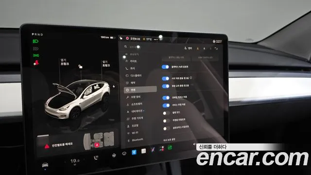 Tesla Model Y — Фото автомобиля 23