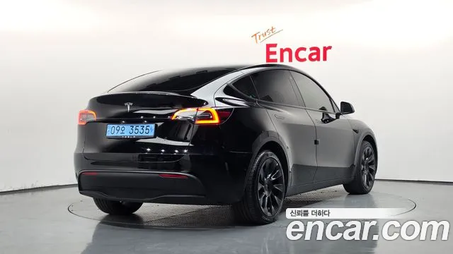 Tesla Model Y — Фото автомобиля 2