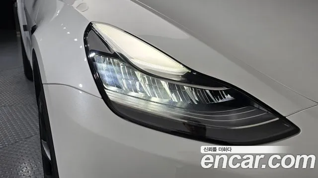Tesla Model Y — Фото автомобиля 7