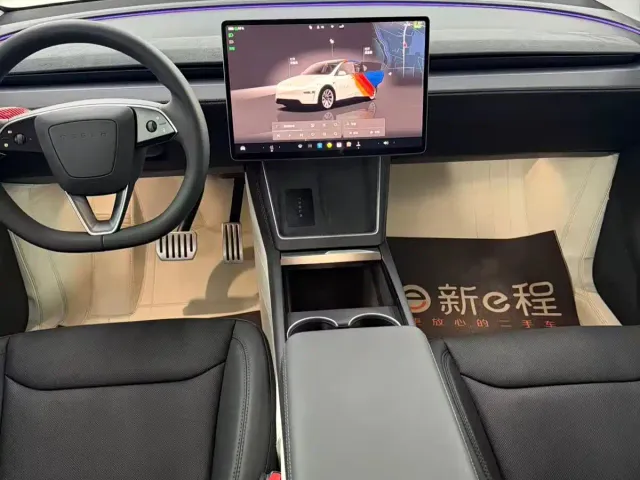 Tesla Model Y — Фото автомобиля 9