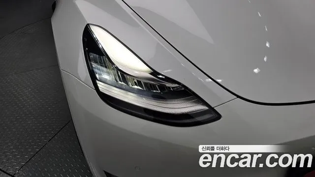 Tesla Model Y — Фото автомобиля 16