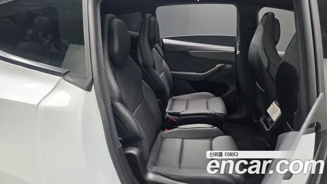Tesla Model Y — Фото автомобиля 17