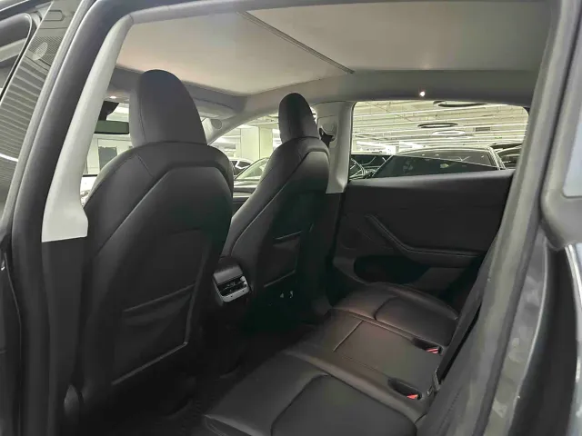 Tesla Model Y — Фото автомобиля 6
