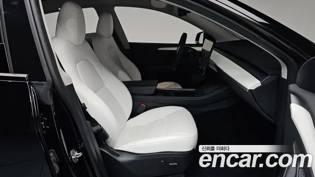 Tesla Model Y — Фото автомобиля 17