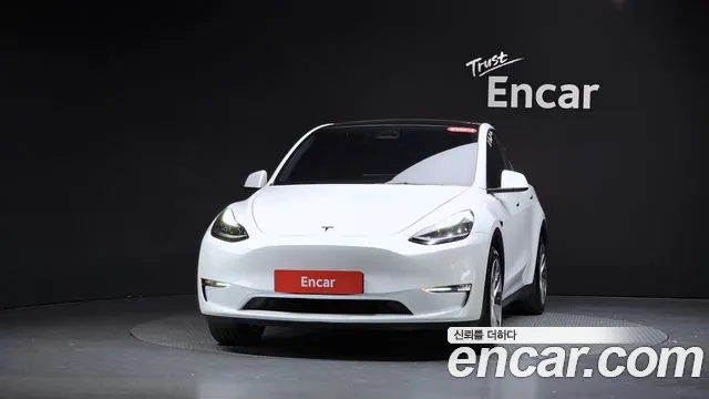 Tesla Model Y — Фото автомобиля 3