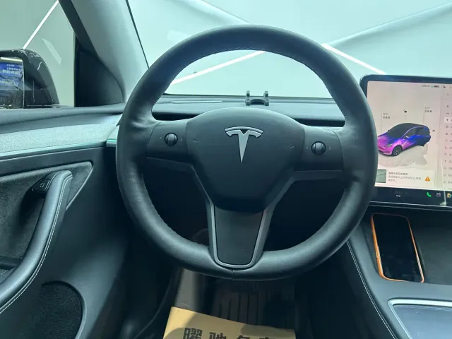 Tesla Model Y — Фото автомобиля 11