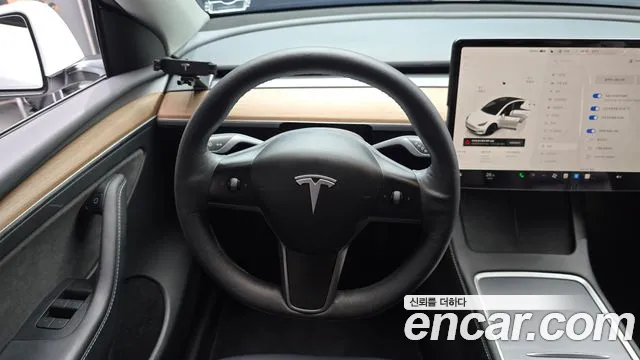 Tesla Model Y — Фото автомобиля 13