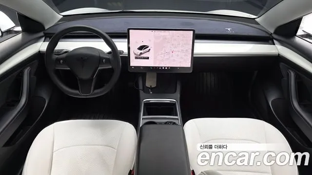 Tesla Model 3 — Фото автомобиля 10